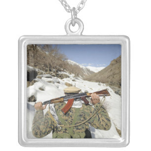 A Mujahadeen Guard walks with US Military membe Silver Plated Necklace