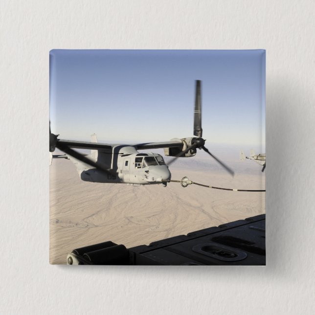 A MV-22 Osprey refuels midflight Button (Front)