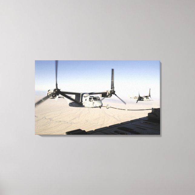 A MV-22 Osprey refuels midflight Canvas Print (Front)