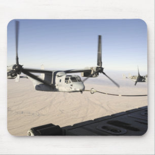 A MV-22 Osprey refuels midflight Mouse Pad