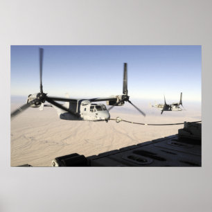 A MV-22 Osprey refuels midflight Poster