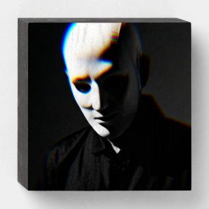 A mysterious scary man on a wooden box sign