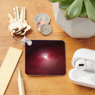 A Neutron Star With A Disk Of Warm Dust. Keychain