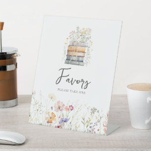 A New Chapter Begins Wildflower Book Favors Pedestal Sign