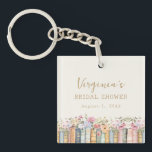 A New Chapter Books Bridal Shower Keychain<br><div class="desc">A New Chapter Begins. Carry a piece of your love story everywhere with the Wildflower and Books keychain, a small but meaningful keepsake that blends literary charm with timeless elegance. Featuring handpainted watercolor illustrations of stacked books and delicate wildflowers in soft pinks, blues, greens, and gold, this beautifully designed keychain...</div>