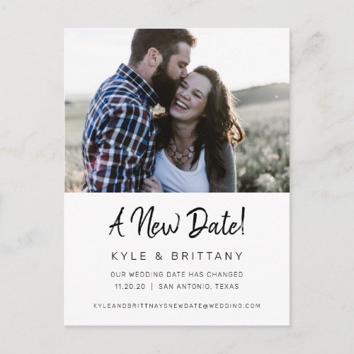 A New Date Modern Script Wedding Postponement Postcard