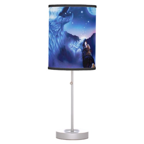 A pack of wolves on a dark night table lamp