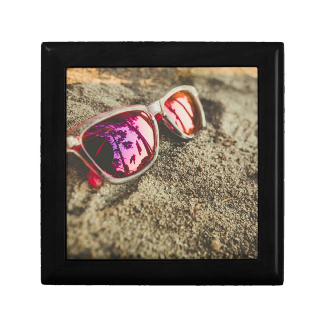 A Pair Of Fashionable Sunglasses On The Beach Keepsake Box (Front)