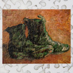 A Pair of Shoes by Vincent van Gogh Jigsaw Puzzle<br><div class="desc">A Pair of Shoes by Vincent van Gogh is a vintage fine art post impressionism still life painting featuring an old pair of peasant farmer boots. About the artist: Vincent Willem van Gogh was a Post Impressionist painter whose work was most notable for its rough beauty, emotional honesty, and bold...</div>