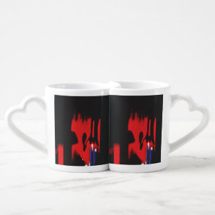 a pair of shoes sitting on top of a floor coffee mug set