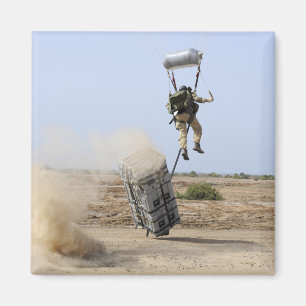 A pararescueman drops into the zone magnet