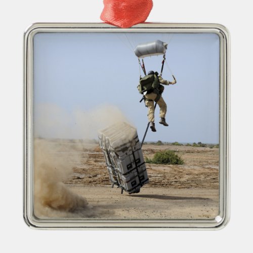 A pararescueman drops into the zone metal ornament