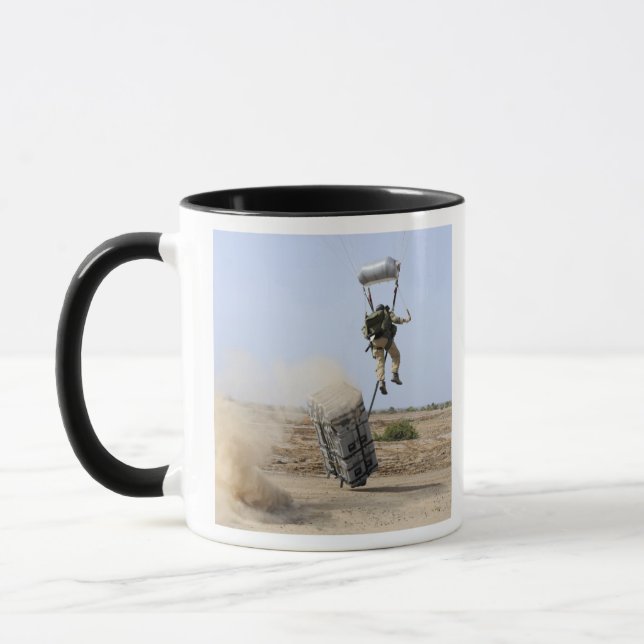 A pararescueman drops into the zone mug (Left)
