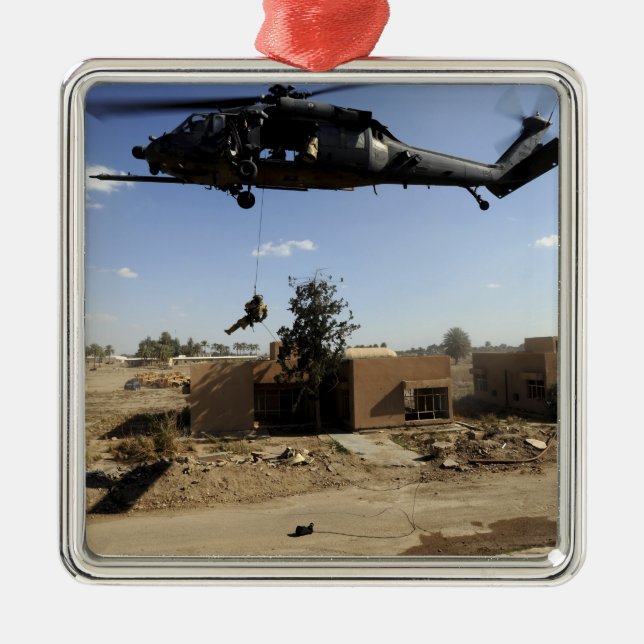 A pararescueman rappels from an HH-60 2 Metal Ornament (Front)