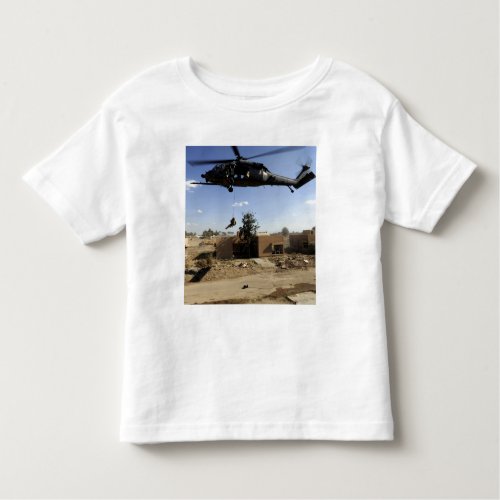 A pararescueman rappels from an HH_60 2 Toddler T_shirt