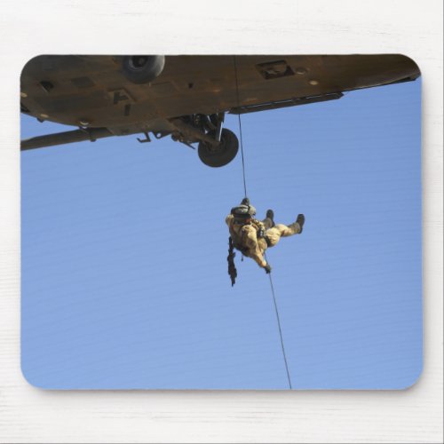 A pararescueman rappels from an HH_60 Mouse Pad