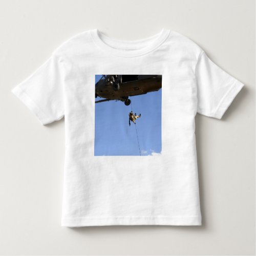 A pararescueman rappels from an HH_60 Toddler T_shirt