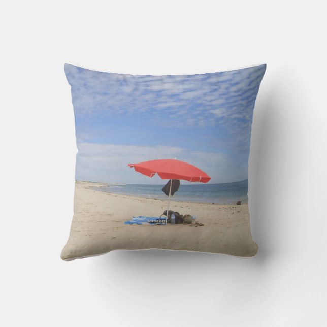 A parasol and the sea. throw pillow (Back)