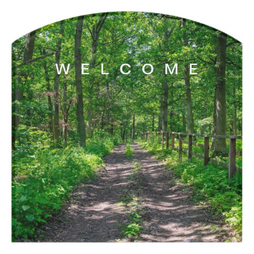 A path in the green forest door sign