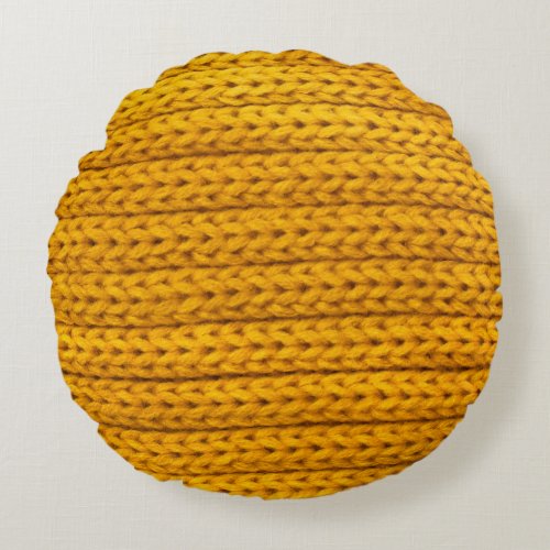 A pattern of yellow knitted fabric of yarn round pillow