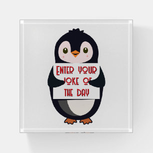 A penguin holding a sign with custom text paperweight