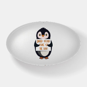 A penguin holding a sign with custom text paperweight