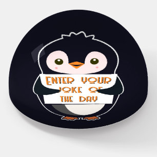 A penguin holding a sign with custom text paperweight