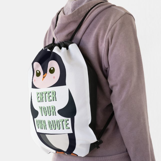 A penguin holding a sign with customizable text th drawstring bag (Insitu)