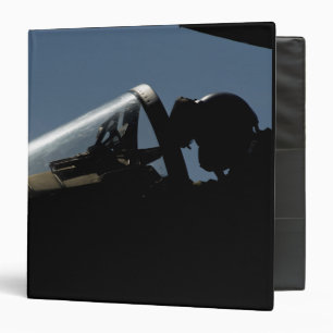 A pilot prepares for take-off 3 ring binder