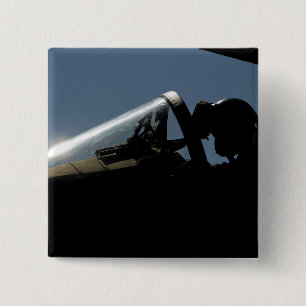 A pilot prepares for take-off button