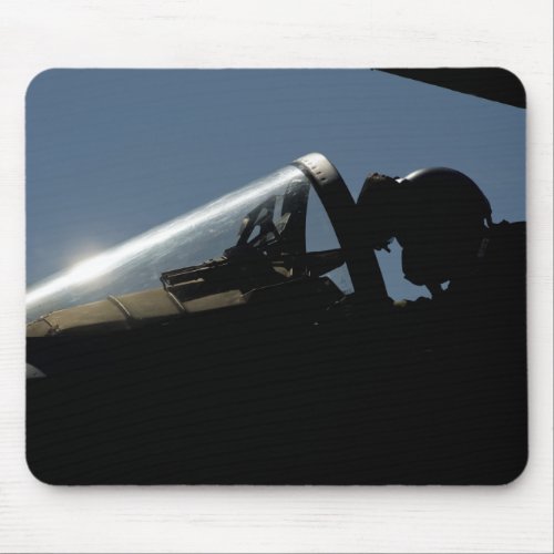 A pilot prepares for take_off mouse pad