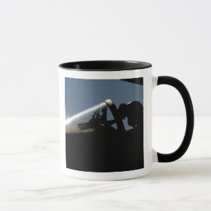 A pilot prepares for take-off mug