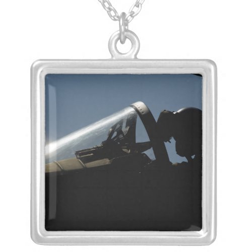 A pilot prepares for take_off silver plated necklace