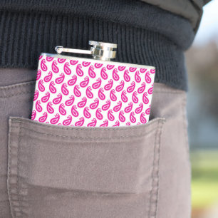 a pink and white background with a pattern flask