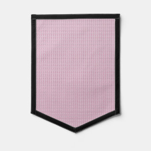 a pink and white background with wavy lines pennant