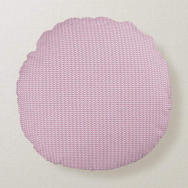 a pink and white background with wavy lines round pillow (Front)