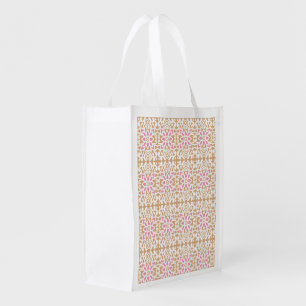 a pink and white flower pattern on a brown backgro grocery bag