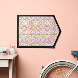 a pink and white flower pattern on a brown backgro pennant