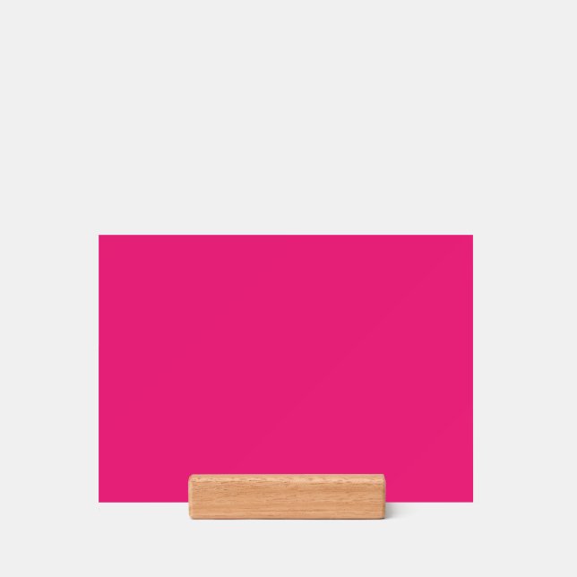 a pink background with a black border holder (Woodblock)