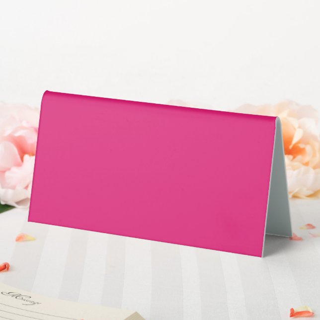 a pink background with a black border table tent (In SItu (Wedding))
