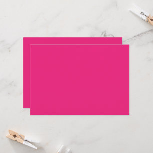 a pink background with a black invitation