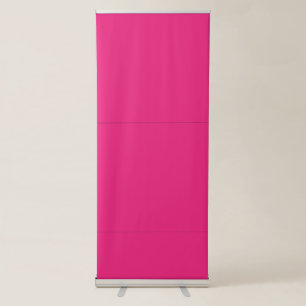a pink background with a black retractable banner