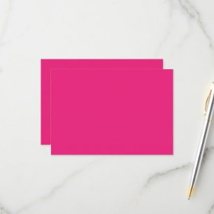 a pink background with a black RSVP card