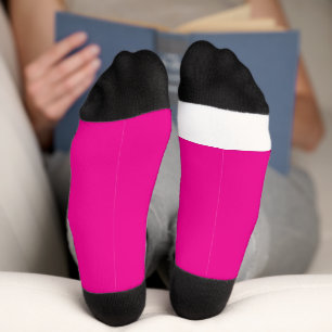 a pink background with a socks
