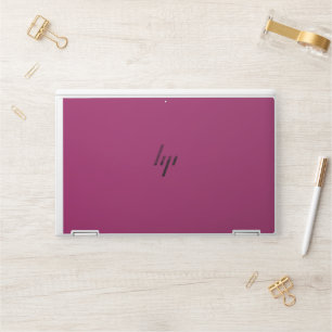 a pink background with a white border HP laptop skin