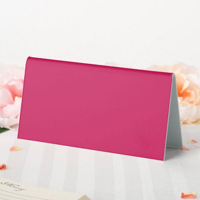 a pink background with a white border table tent (In SItu (Wedding))