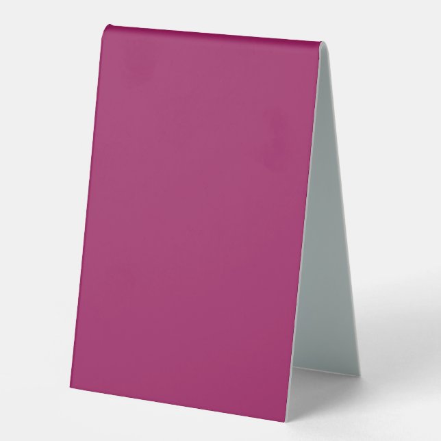 a pink background with a white border table tent (Front)