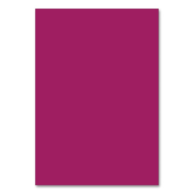 a pink background with a white table number (Front)