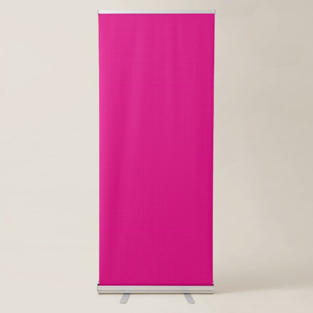 a pink background with white polka dots retractable banner (Front)