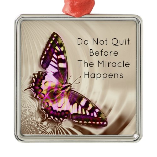 A pink butterfly on a cream satin background metal ornament